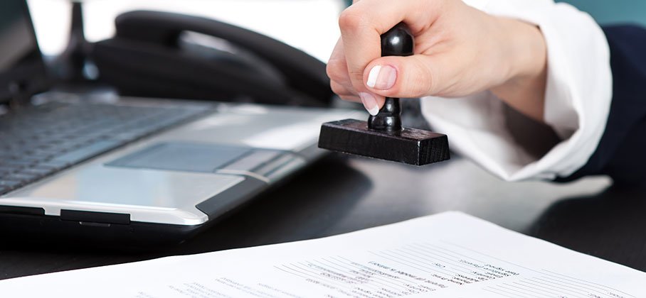 Business licences and permits within Port Hope Stamp of approval on a document