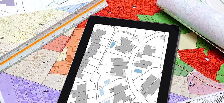 Map of zoning location and a tablet