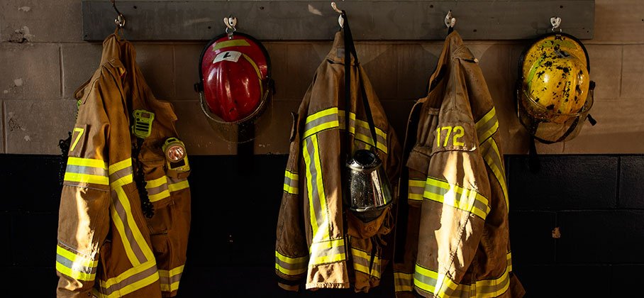 Bunker gear hanging on hooks