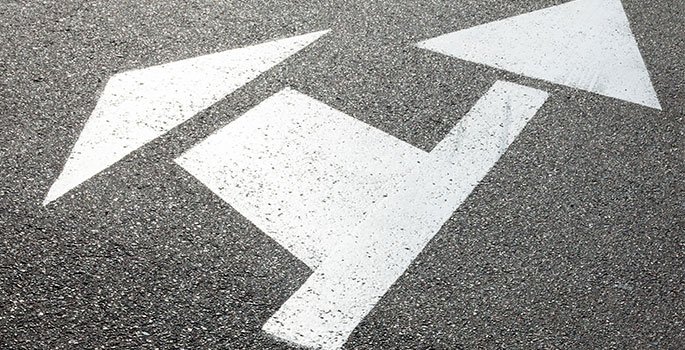 Pavement with two directional arrows