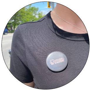 Blue Button with words Be Walton in pink