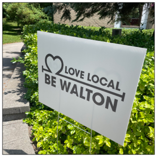Sand Colour lawn sign with the words Love Local Be Walton