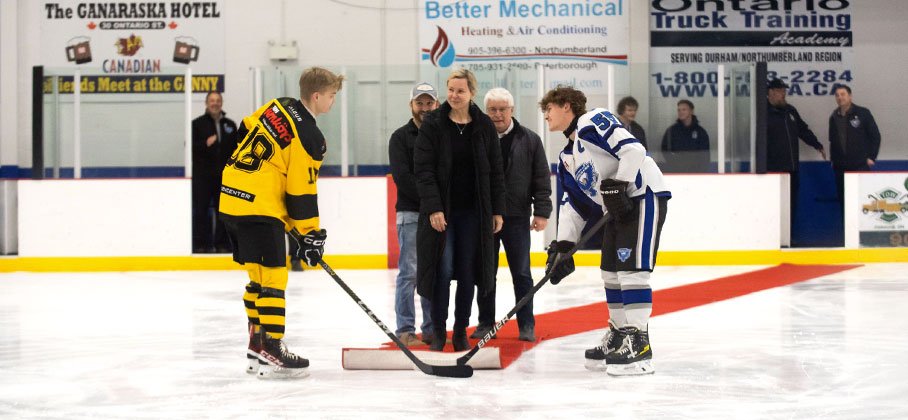 image of Mayor and Councillors dropping the puck at a hockey game
