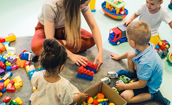 Group of children with child care provider