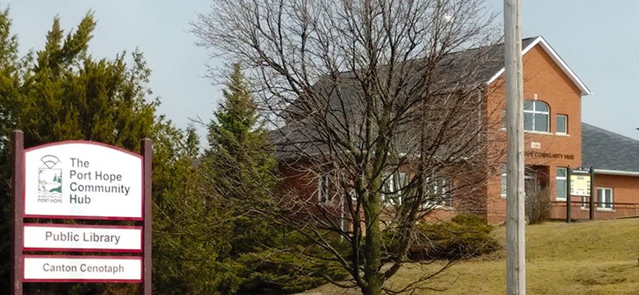 Port Hope Community Hub facility exterior and road sign