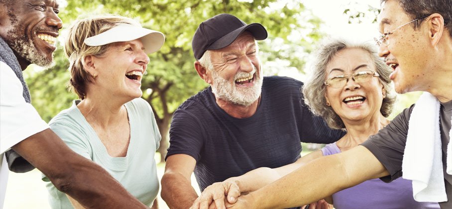 A group of older adult friends outside