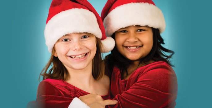 Two girls in holiday outfits