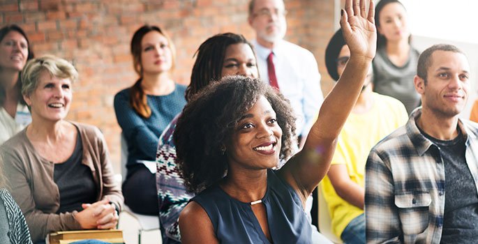 Woman raising her hand