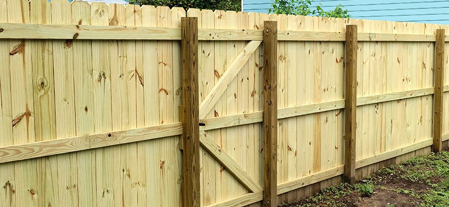 Wood fence between houses